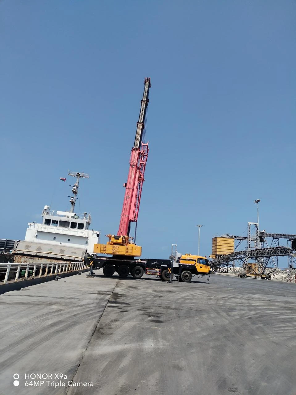 Crane beside a vessel